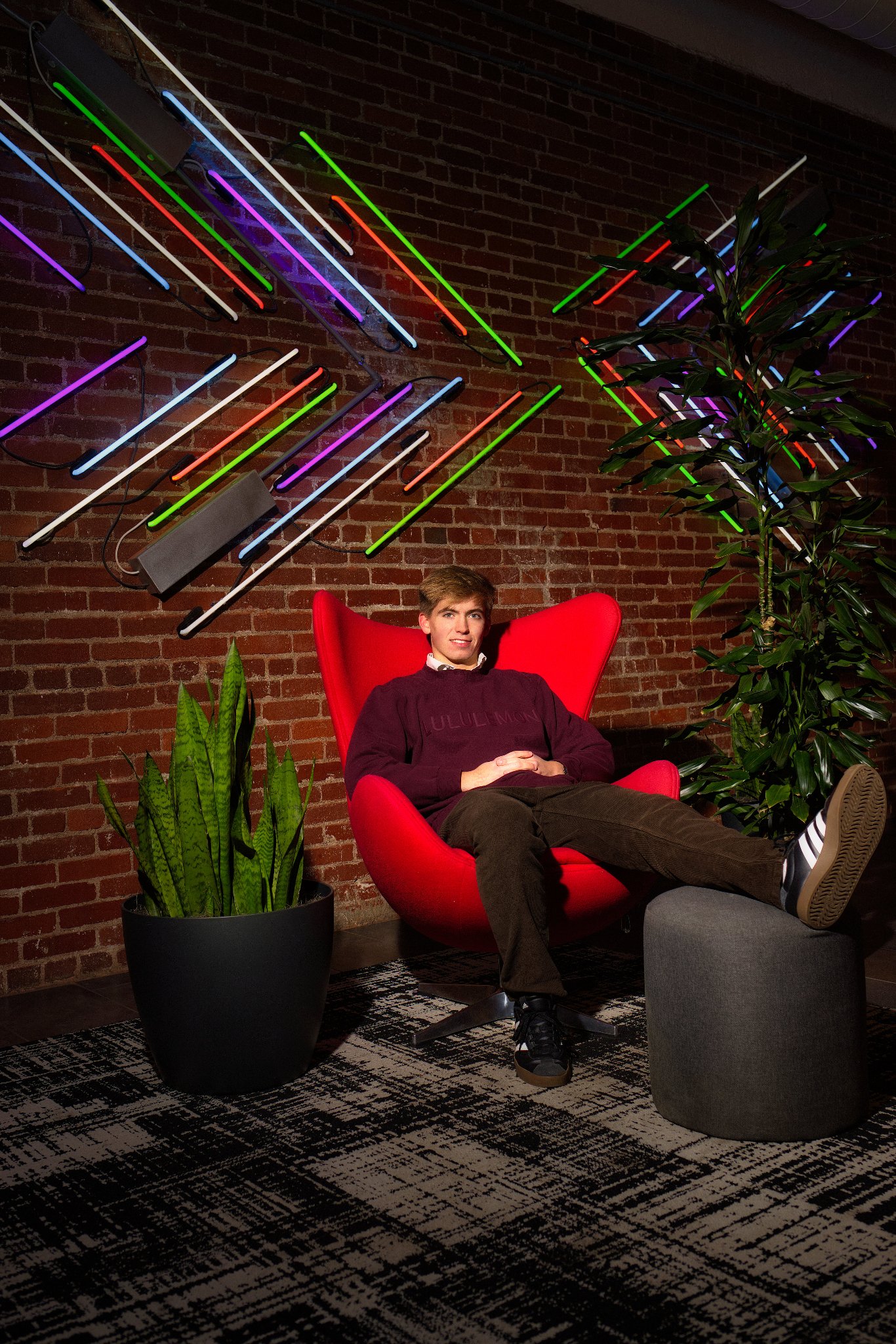 Senior portrait — neon light studio session