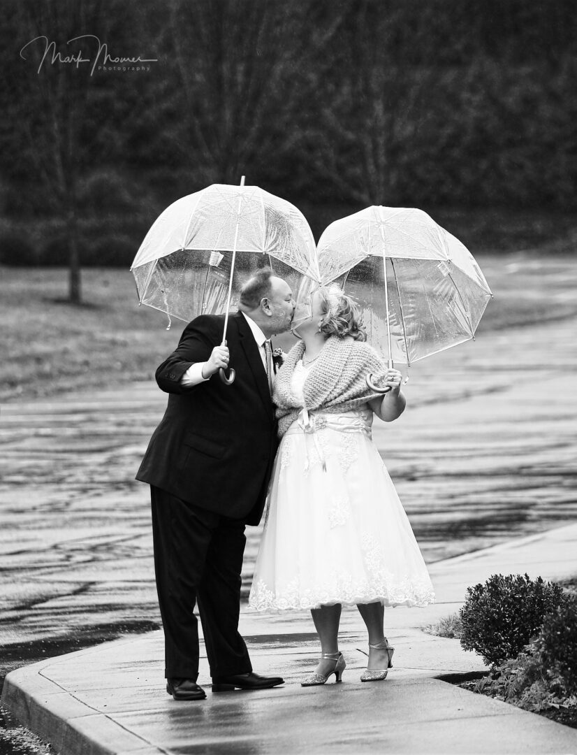 Dancing in the rain after a wedding