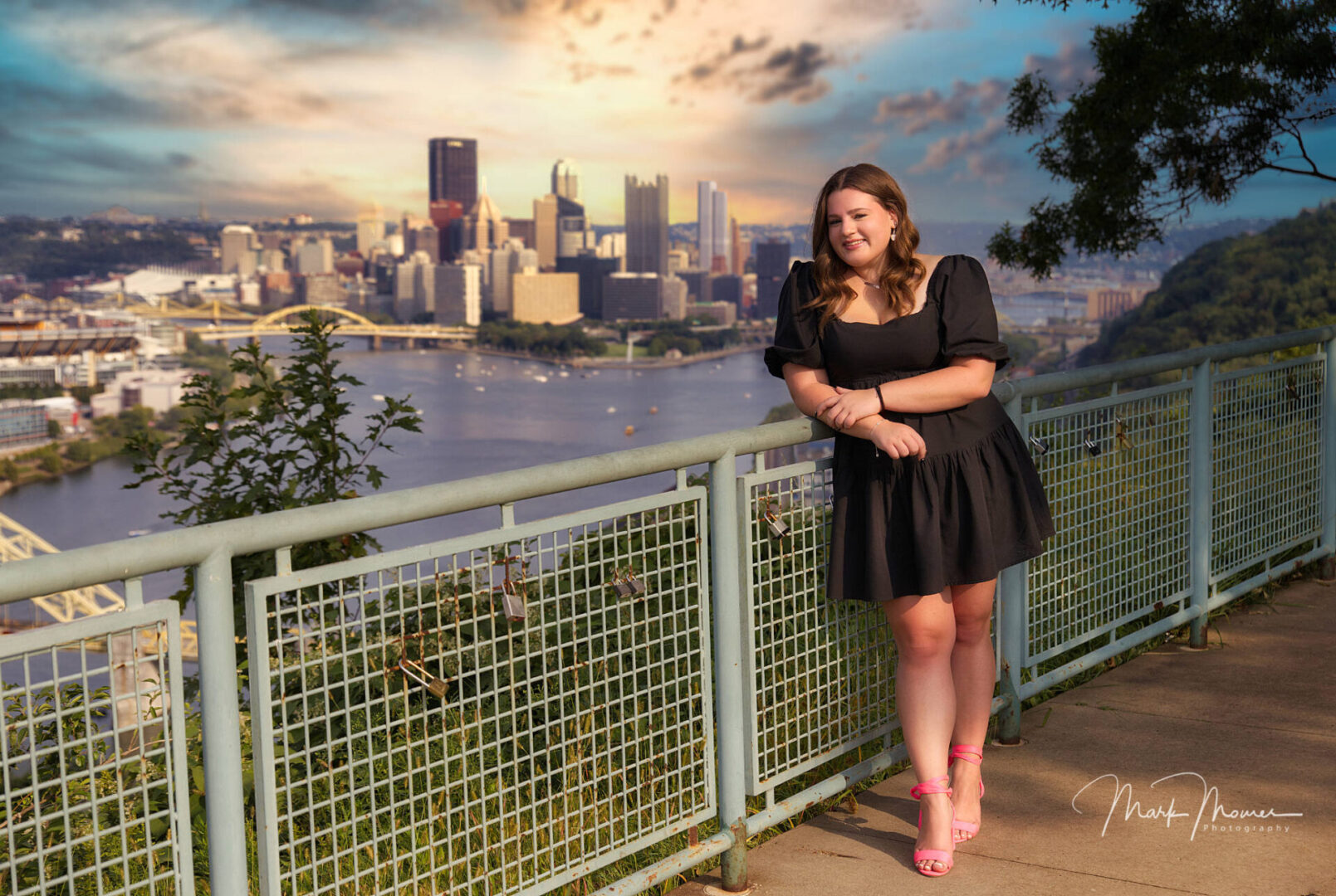 senior portrait with Pittsburgh in the background