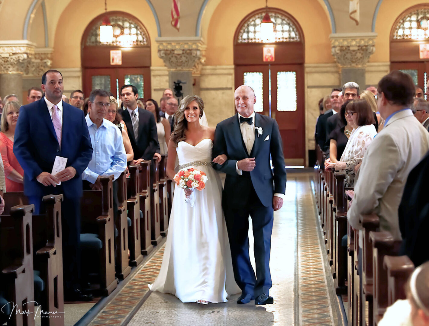 Bride walking down the aisle with her father