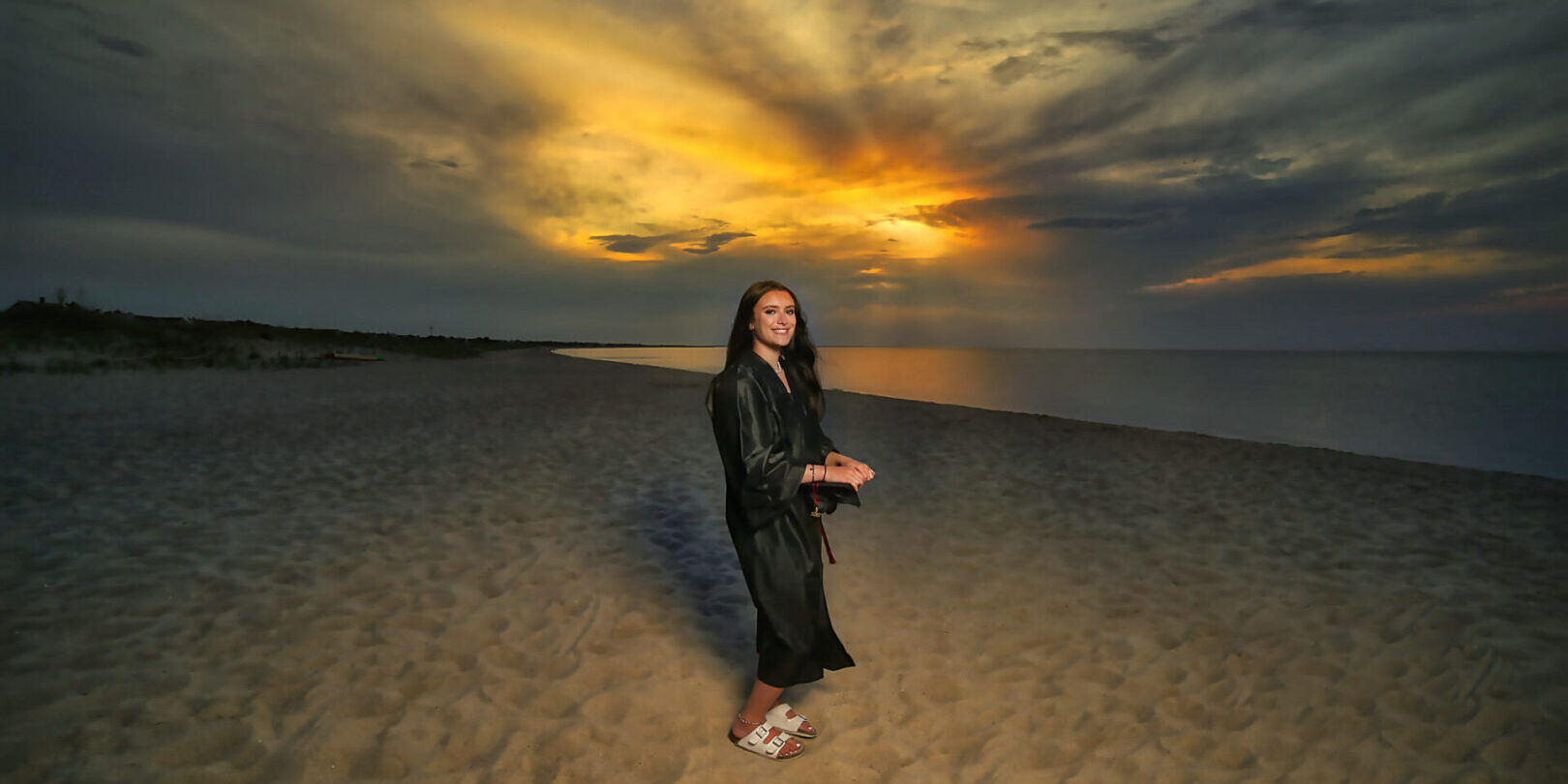 young lady posing at the beach